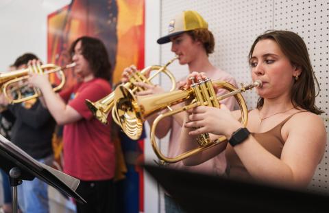 UNH students playing instruments