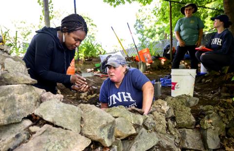 Kabria Baumgartner and Meghan Howey at a dig site