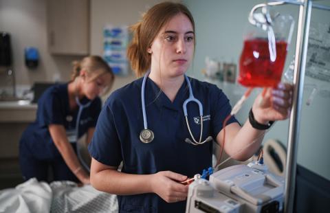 A nursing student works in UNH's Health Sciences Simulation Center