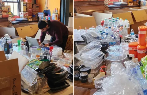 person sorting through recycling in a room