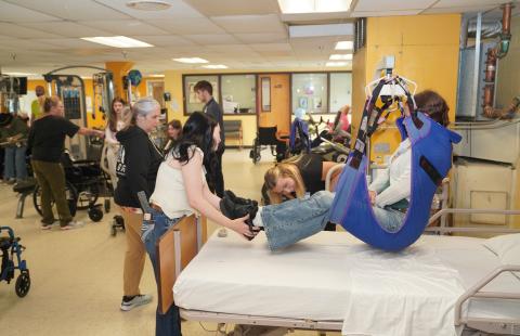 Students learned about rehabilitation and how to move patients carefully during a summer program at Riverside Rest Home in Dover.