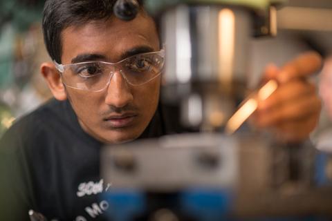 unh researcher in test lab