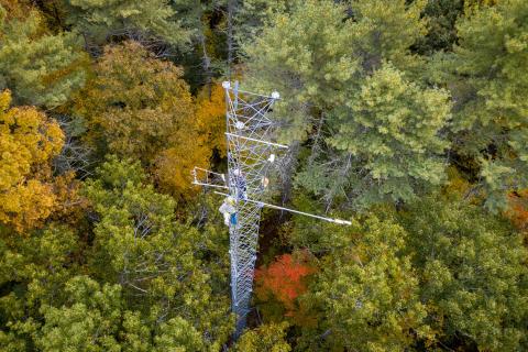 Research tower in forest shot from above