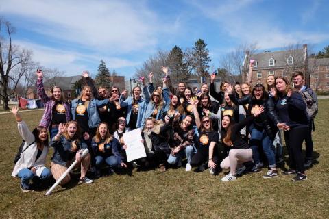 A group of SHARPP volunteers posing for the camera on T-Hall lawn