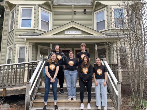 SHARPP Advocate student volunteers standing on steps of Wolff House