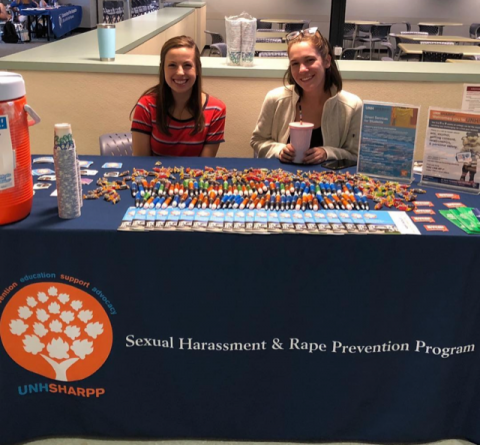 2 SHARPP volunteers tabling
