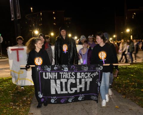 CEs carrying the Take Back The Night Banner