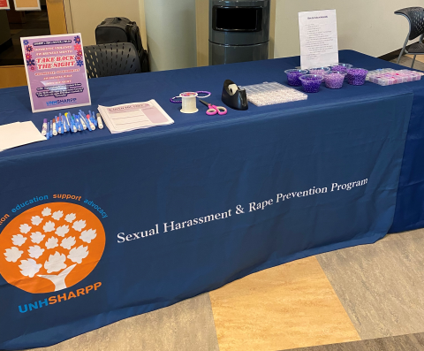 Picture of Domestic Violence Awareness Month Table with Bracelet Making at Law School