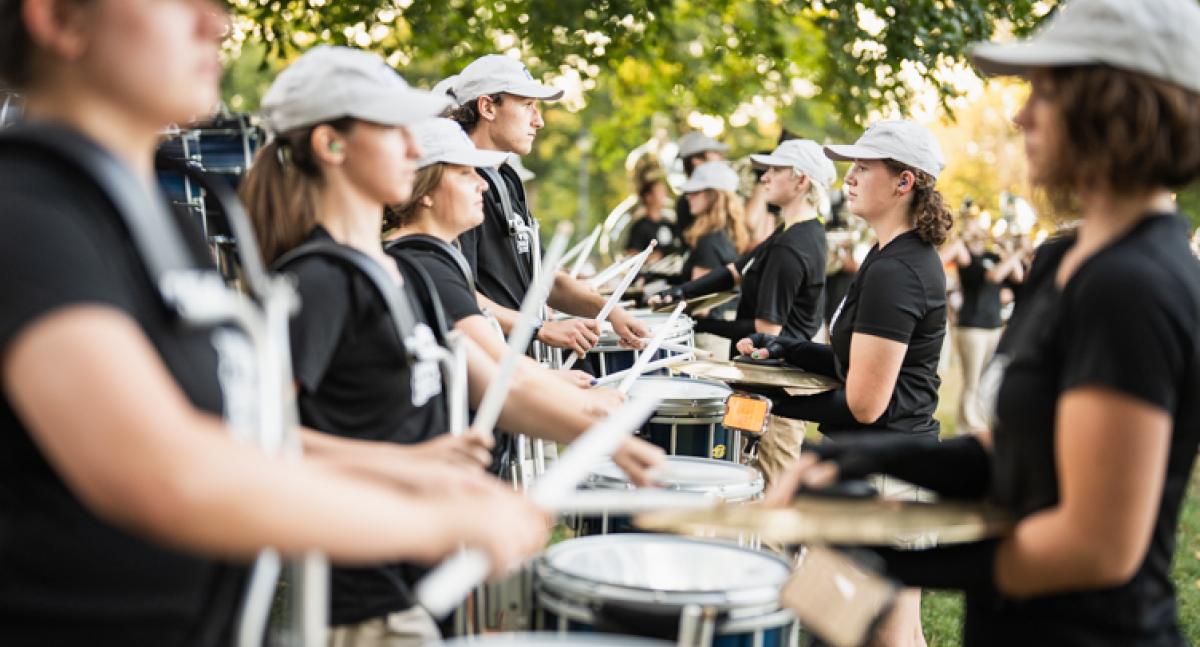 The UNH marching band performs at UDay