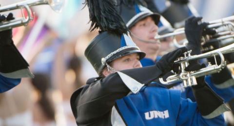 UNH Band members playing during game
