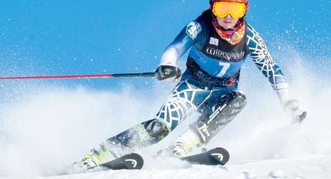 Downhill skiier during race