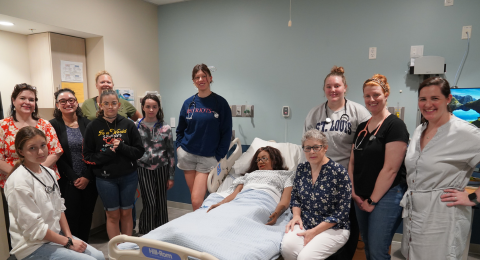 Group photo of students and UNH faculty at summer nursing camp.