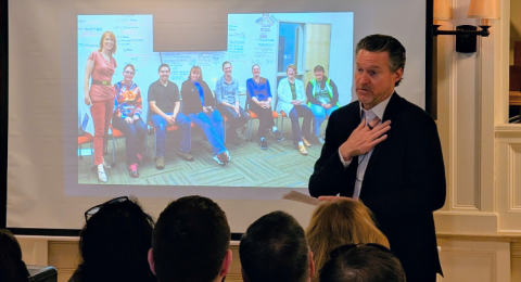 Rod Harl, chairman of Alene Candles, speaks at a recent CEO Speaker Series meeting at the Three Chimneys Inn in Durham.