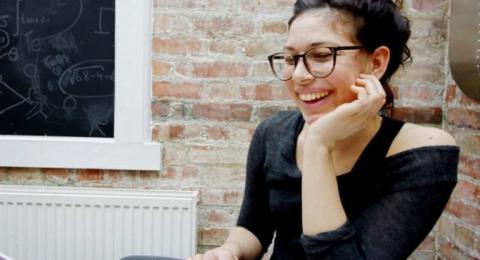 female student looking at a computer