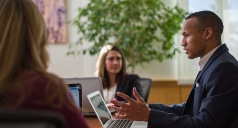 Man in front of a computer