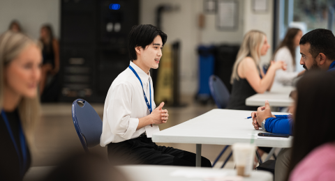 UNH students competing in Speed Sell.
