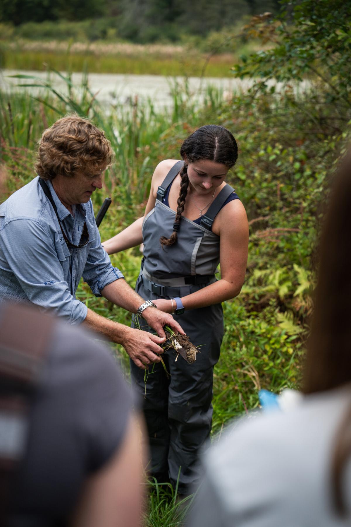 Aquatic Plants in Restoration and Management class outdoors in the field