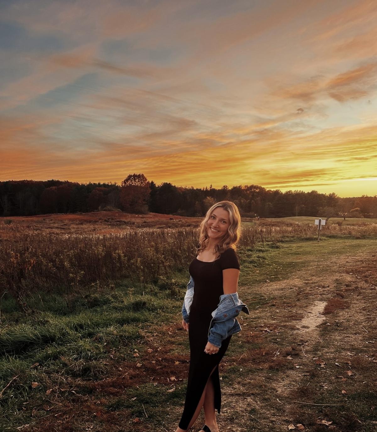 Morgan with a sunset