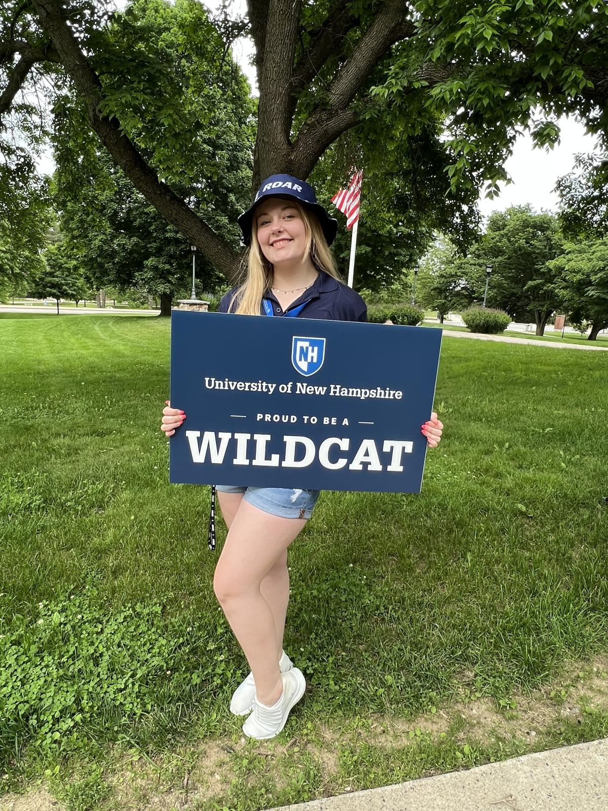 Emma with Wildcat sign