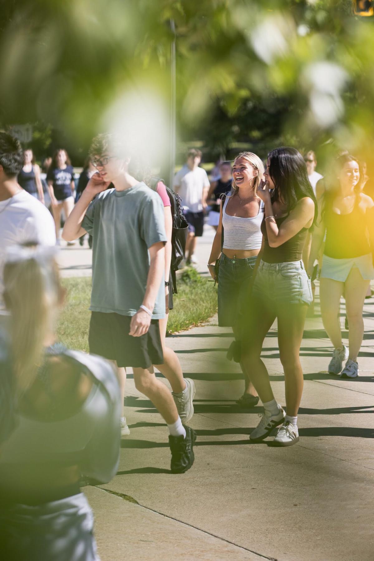 Students walk campus during move-in weekend