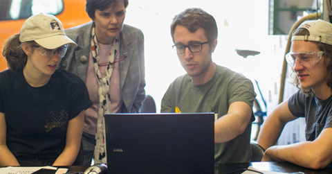 Students around computer