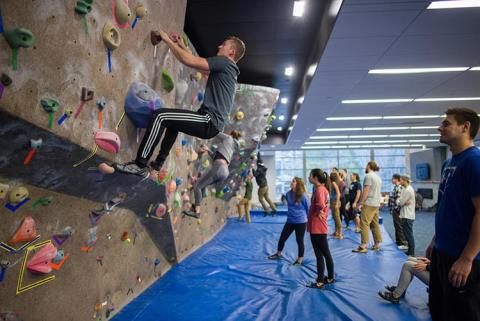 unh students on the climbing wall