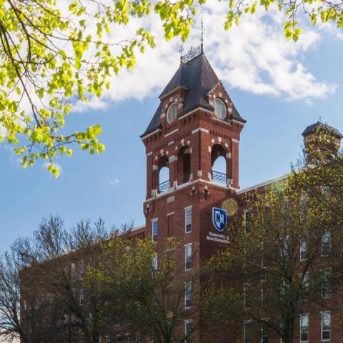 UNH Manchester millyard building exterior in the spring