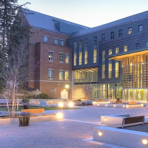 UNH Paul College building outside at dusk