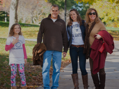 Parents and student on UNH family weekend