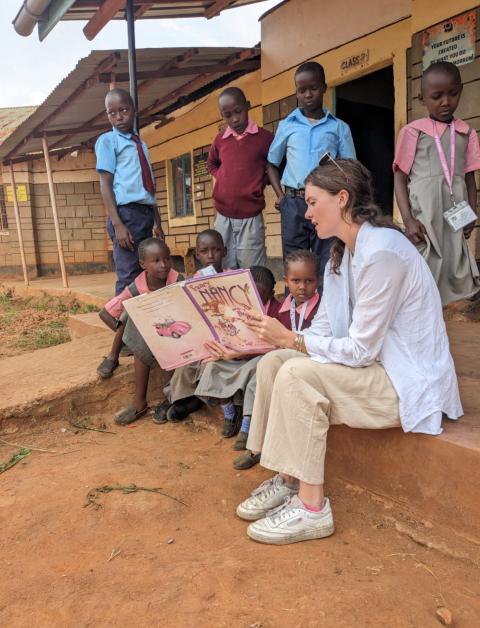 Maggie Mahoney reading to Kenyan schoolchildren.