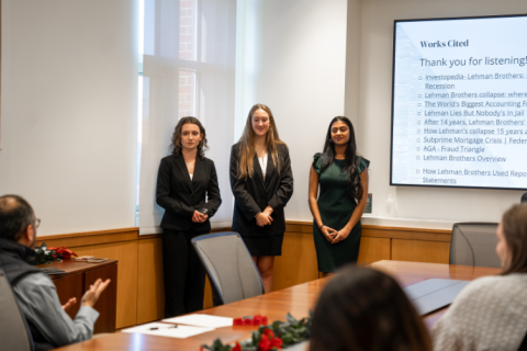 Portsmouth High School students&nbsp;Rena Eberhardt, Sophia Berling, and&nbsp;Isha Shah present during the&nbsp;fraud exploration challenge at the “Is Accounting for Me?” held at Paul College in December.