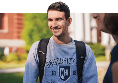 Photo of studet outside with backpack on