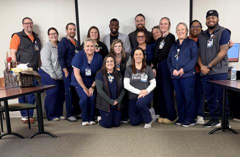 Darius Love with his coworkers,