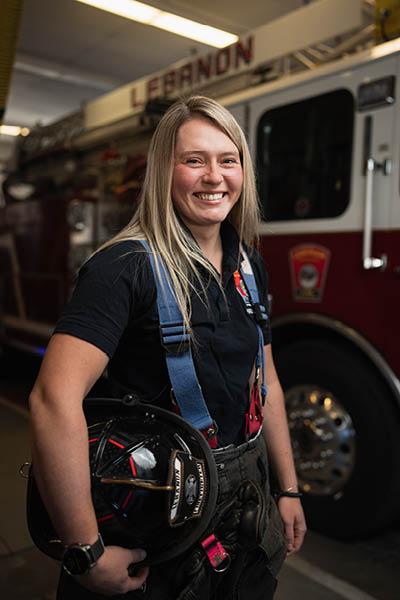 Kayleigh Eastman in firefighter uniform