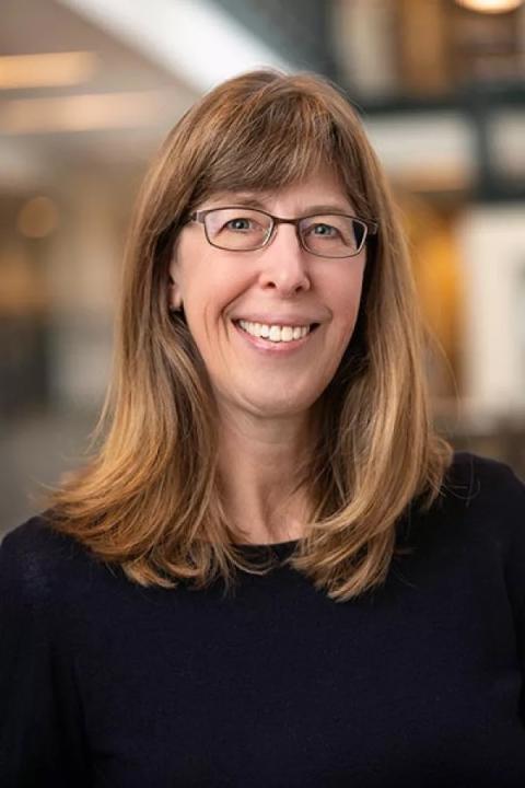 Headshot of woman wearing glasses
