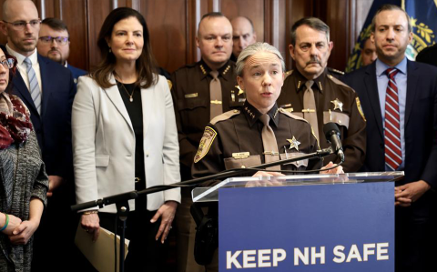 MPA alum Kathryn Mone speaking at a press conference