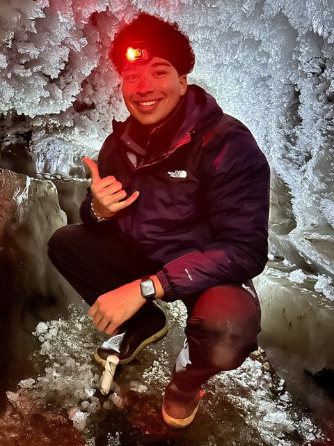 Cole Robinson wears a headlamp while working in the Arctic
