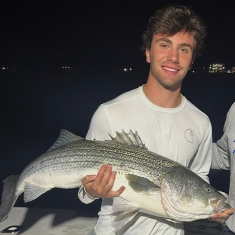 person holding a large fish
