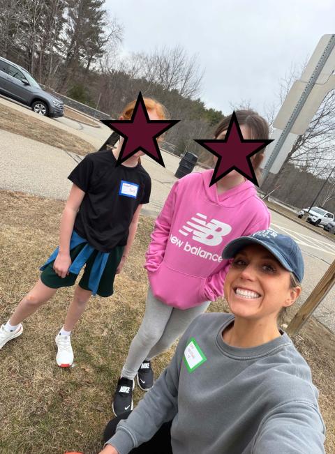 Robb volunteering as a coach for Girls on the Run, a nonprofit program that helps build confidence and life skills through running. 