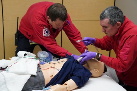 Paramedics with McGregor Memorial EMS train with health simulations at UNH.