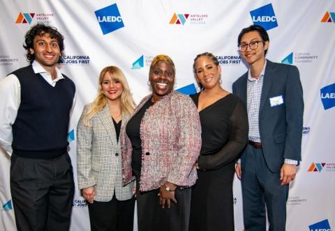 MPA alum Chioma Agbahiwe with colleagues at an industry even representing California Jobs First