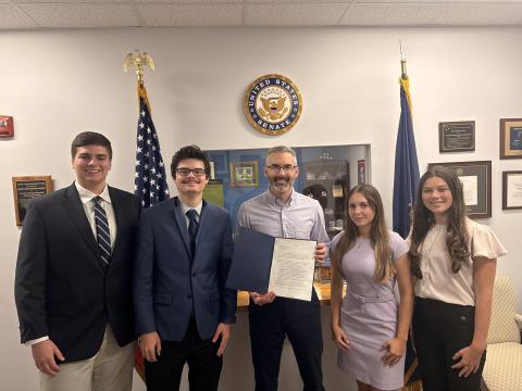 Ben Goguen ’27, far left, joins fellow interns and staff during his summer internship in U.S. Sen. Jeanne Shaheen’s Manchester office.