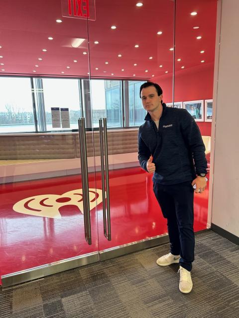 Jon Coughlin stands outside an iHeartRadio studio before recording The Retirement Playbook.