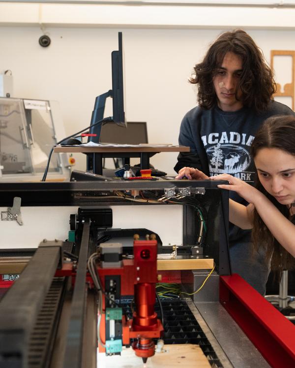 Helping a student in the CEPS Makerspace