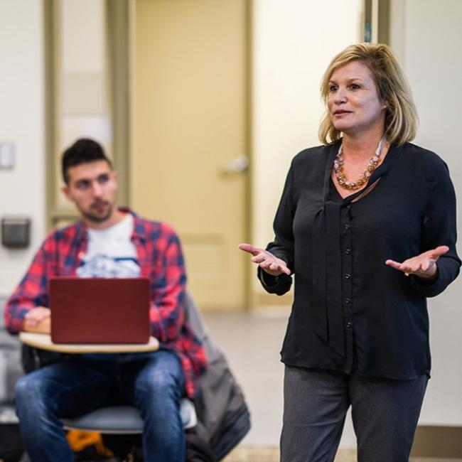 Professor and student in classroom