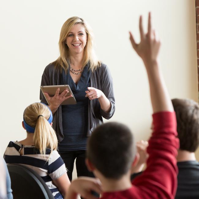 Professor answering a question from a student