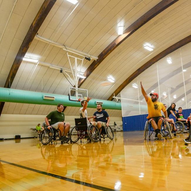 Group of people playing wheelchair ultimate frisbee