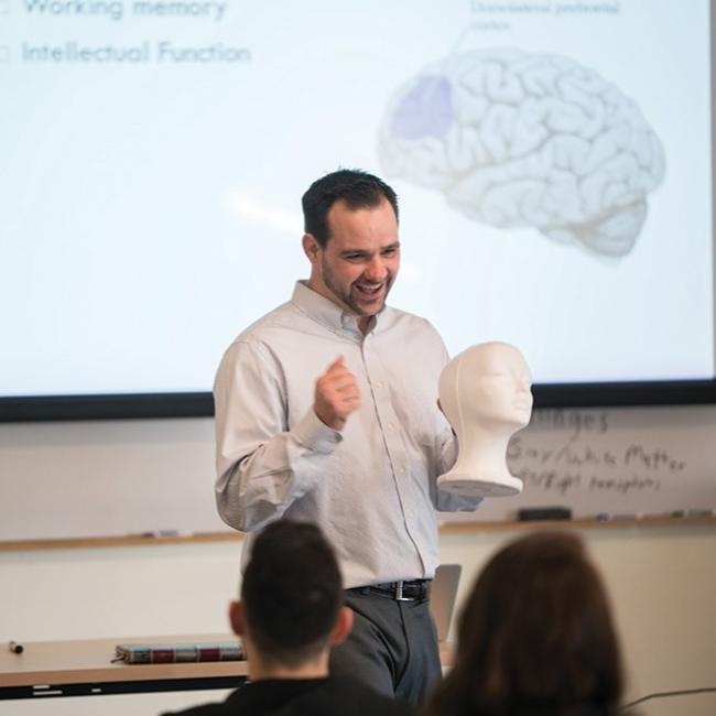 Professor giving a lesson on the brain