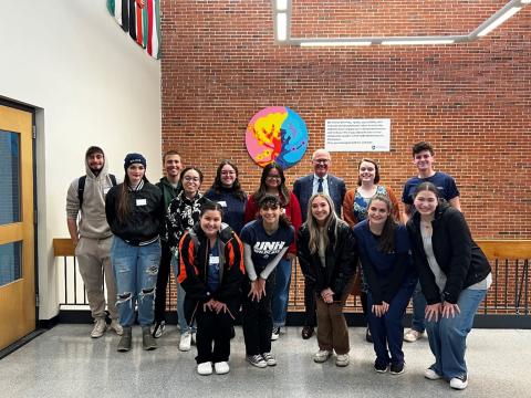 Group photo with first-gen students and President Dean
