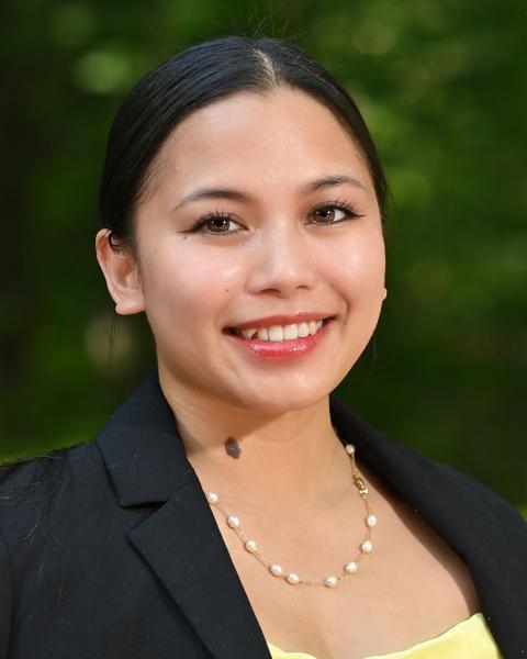 woman smiling, necklace, professional attire, outside